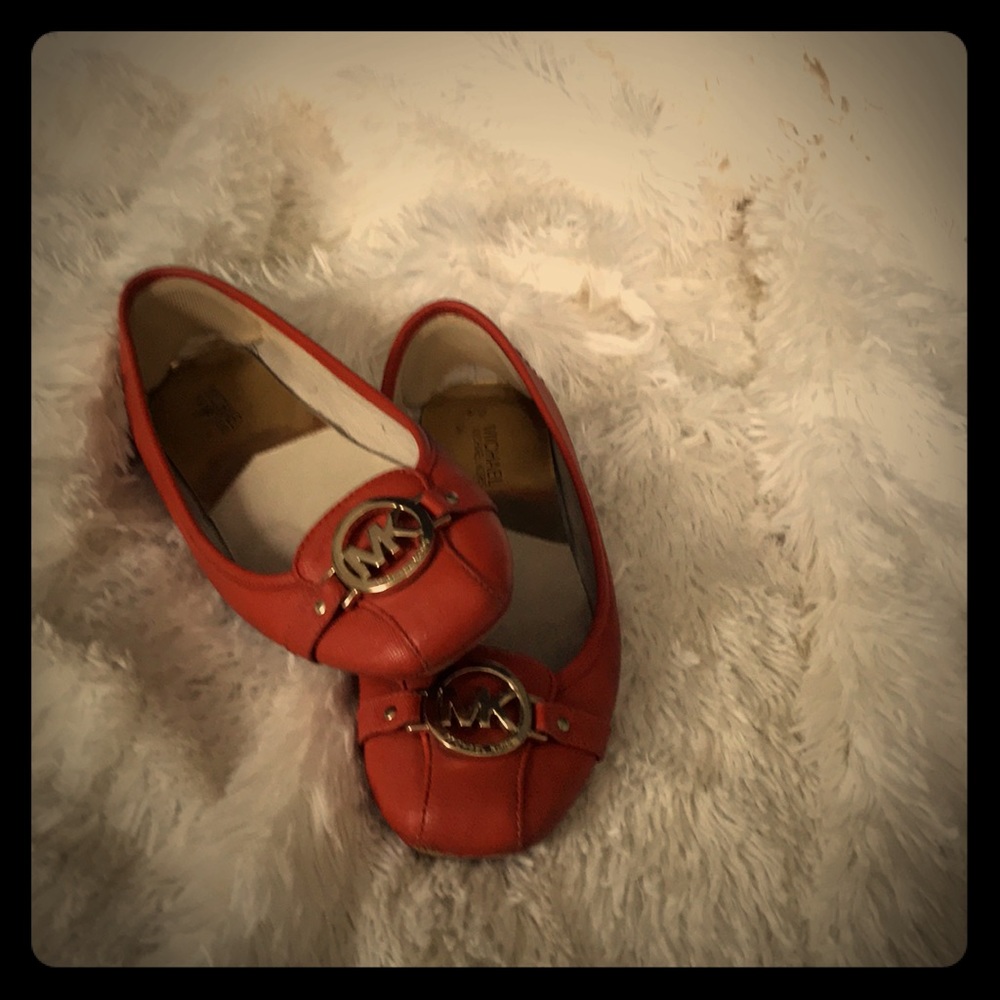 Burnt orange Michael Kors flats
